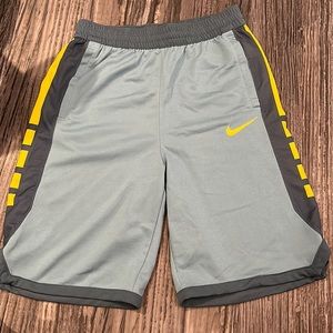 Blue and yellow Nike basketball shorts